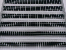 Squirrels were entering though this Louver Vent at a home in Dracut, MA.  We screened off the entrance blocking how the squirrels were entering and exiting (After)