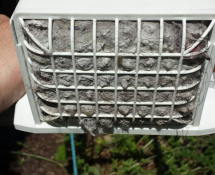 Caged designed like this to keep animals out can collect a lot of lint.  The dryer wont function properly and it could also be a fire hazard (before)
