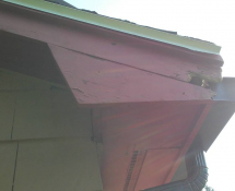 Squirrels chewed their way into the trim of this home in Billerica.  We removed the animals and sealed up the entry point as well painted the repair to match the Trim (Before)