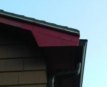 Squirrels chewed their way into the trim of this home in Billerica.  We removed the animals and sealed up the entry point as well painted the repair to match the Trim (After)