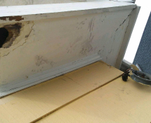 Squirrels chewed a hole through the gable eave return in Medford, MA (Before)