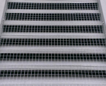 Squirrels were entering though this Louver Vent at a home in Dracut, MA.  We screened off the entrance blocking how the squirrels were entering and exiting (After)