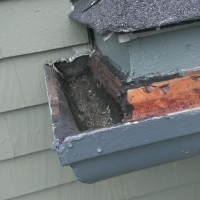This home in Malden had damage to the fascia which is a common entry point for squirrels (before) Fascia Repair 1