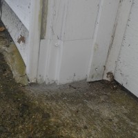Mice were gaining access into a garage in Wilmington, MA.  We sealed off the rotted entrance with some Metal and Mortar. (After) Mice Control and Exclusion 5
