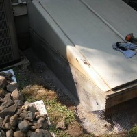 Galvanized welded hardware cloth was attached to the structure and installed in the trench Dug in Underground Exclusion Fence 2